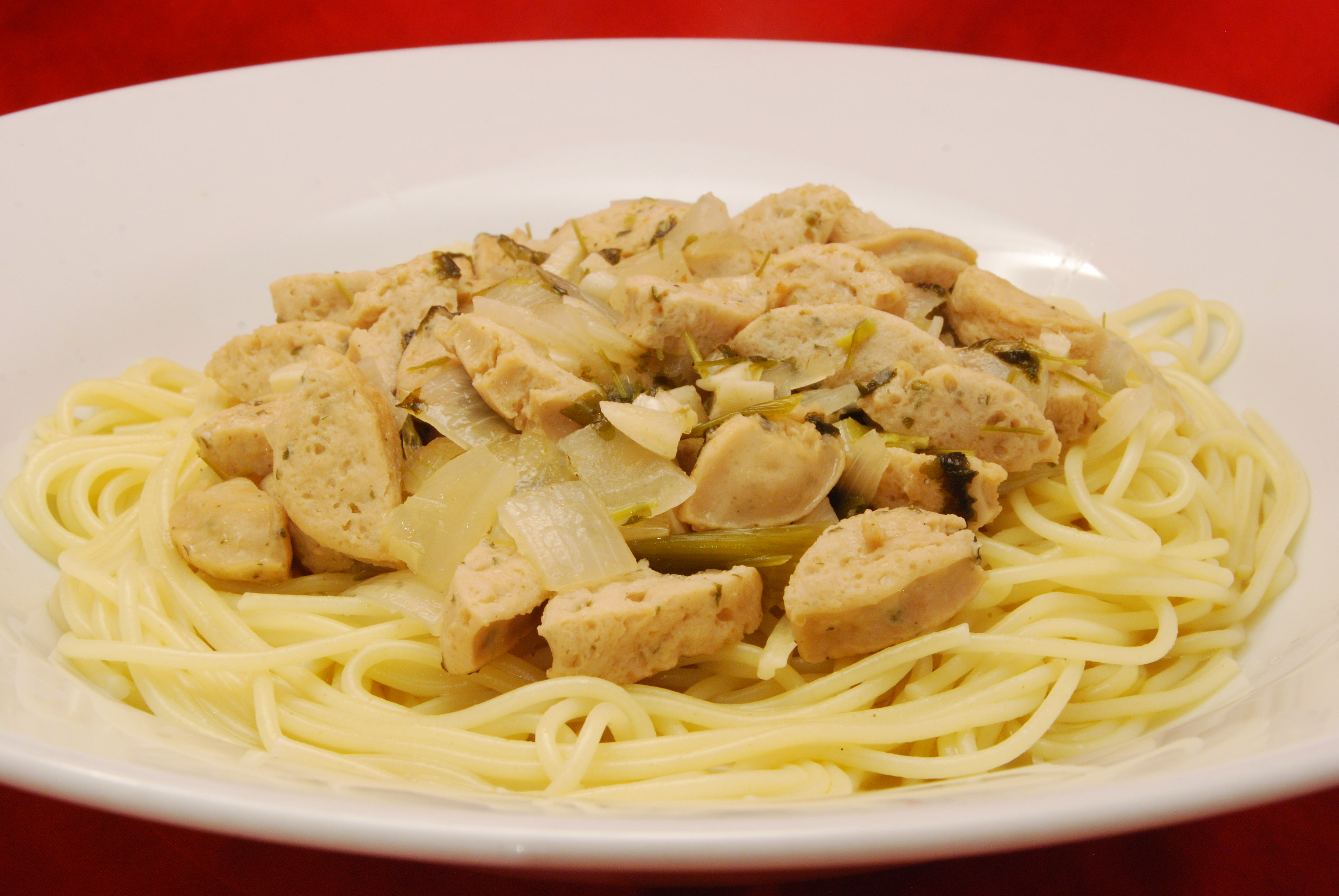 Weißwurst in Weißwein-Sauce mit Spaghetti