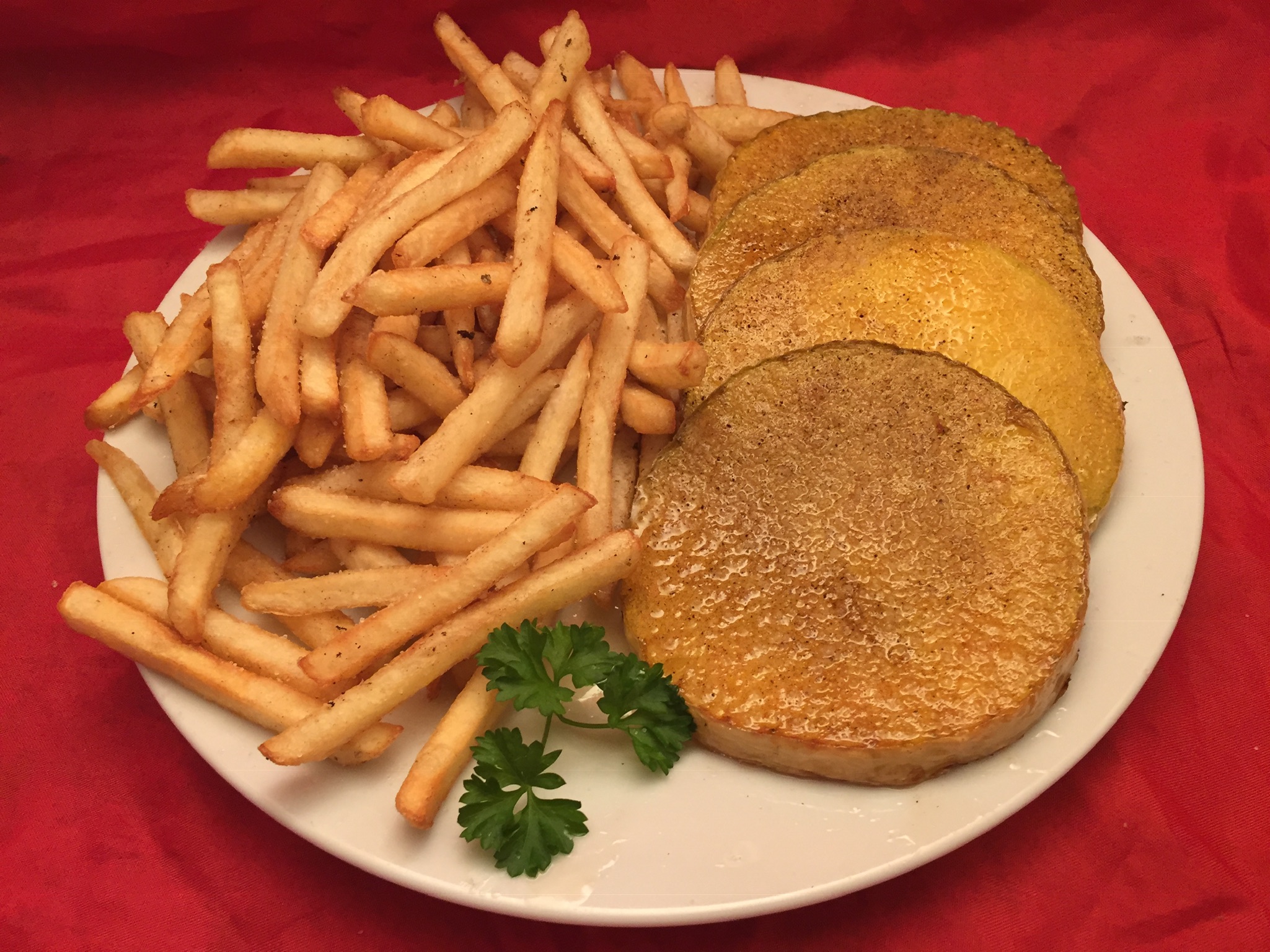 Frittierte Kürbis-Steaks mit Pommes Frites